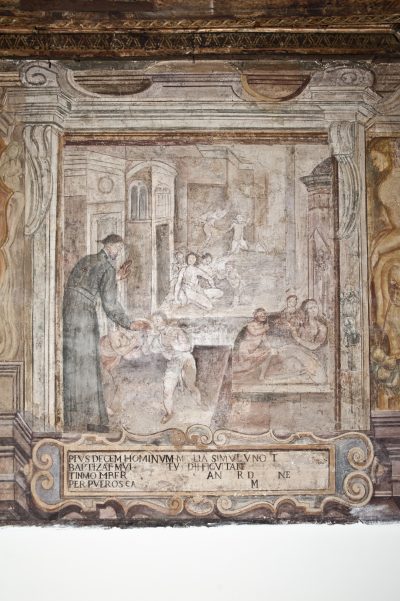 Ignazio di Loyola con i fanciulli di strada di via di Monserrato